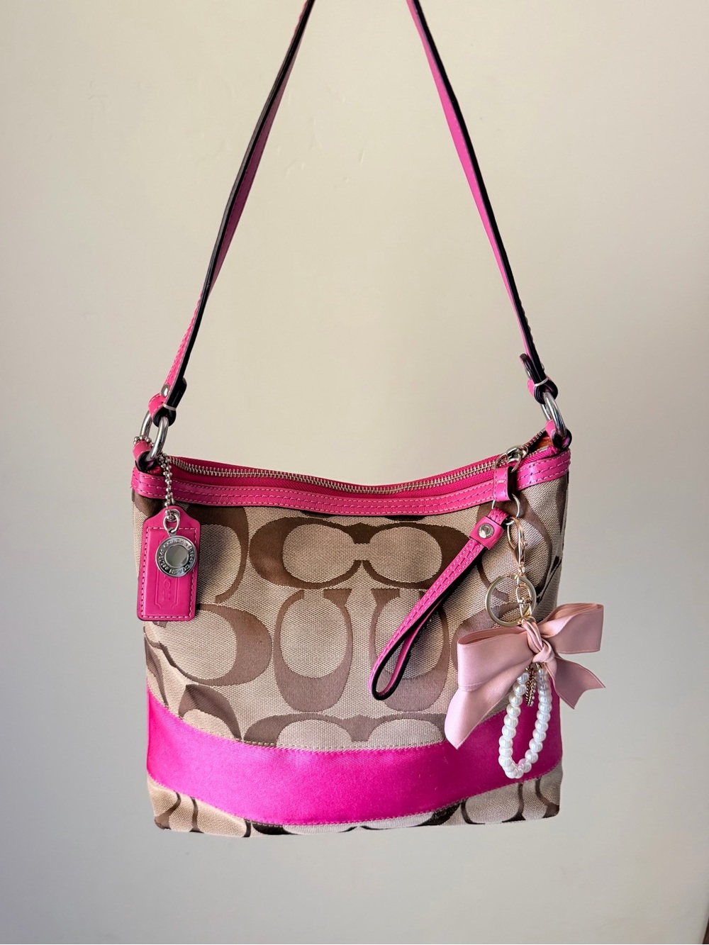 Coach pink & brown logo print handbag with hot pink trim  EUC